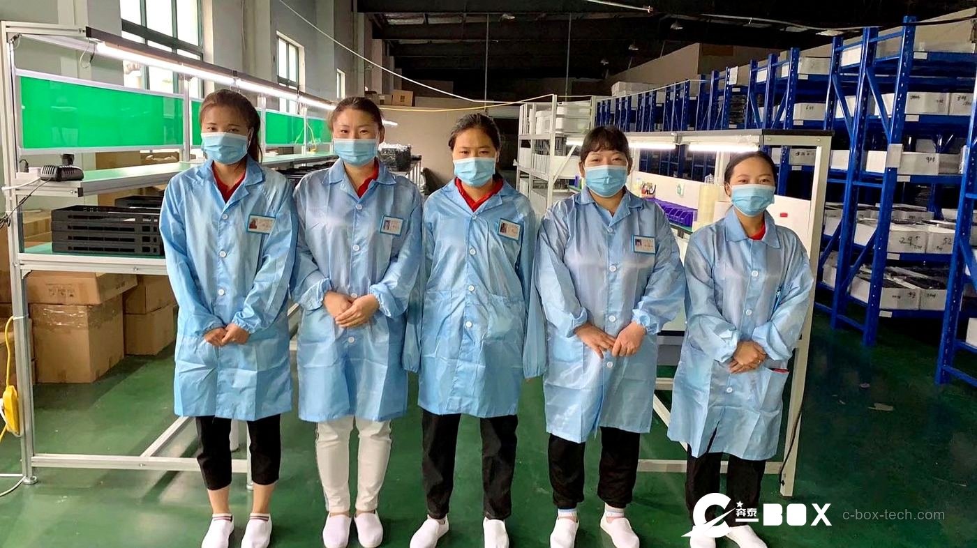 C-BOX production team at the assembly line